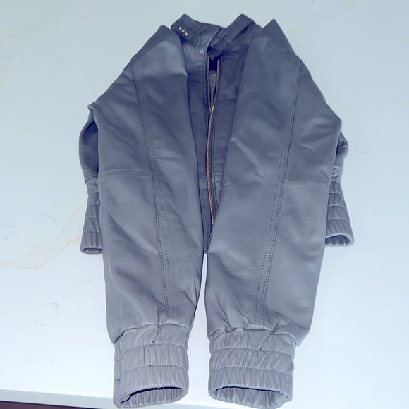 Uniquisim XS Shell 100% Lambskin 100% Polyester - Picture 9 of 12